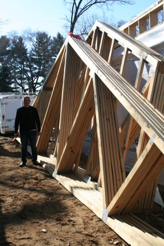 Here I am standing next to some of the trusses, just to give you an idea of the size.