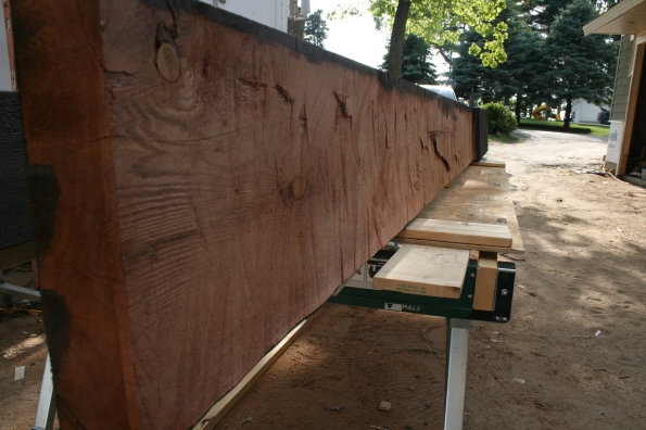 The cedar beams were cut onsite so that they would fit up against the house.